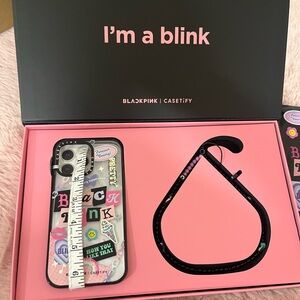 Black Pink  phone case and string to connect on phone.